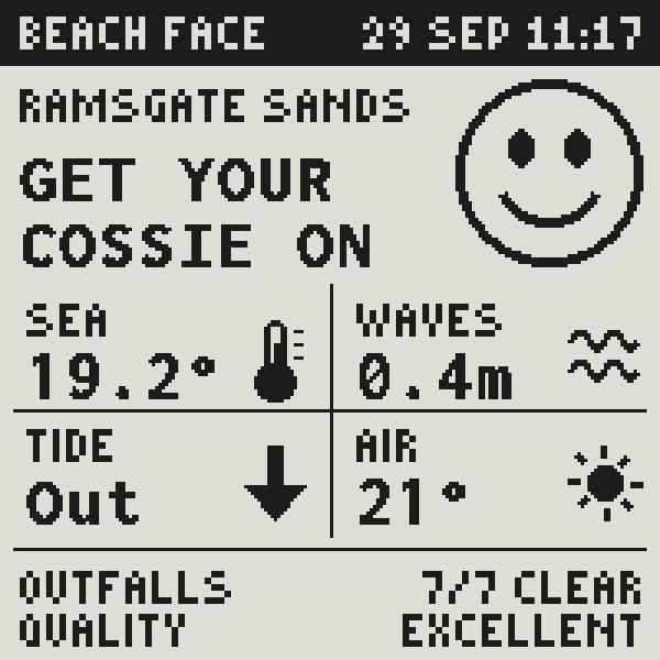 The top half of Beach Face cycling through GET YOUR COSSIE ON, GET IN THE SEA, GO FOR A DIP and WATER’S LOVELY beside the smiley face